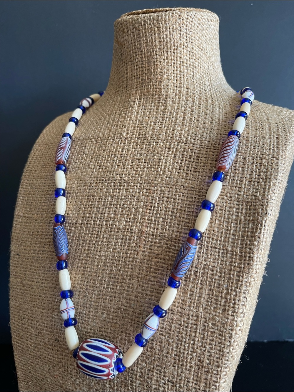 Vintage chevron African trade Blue Glass and carved bone Bead Necklace .